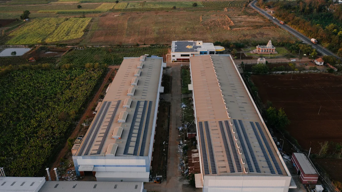Aerial view of a Vijisun Energie solar installation on an institutional campus