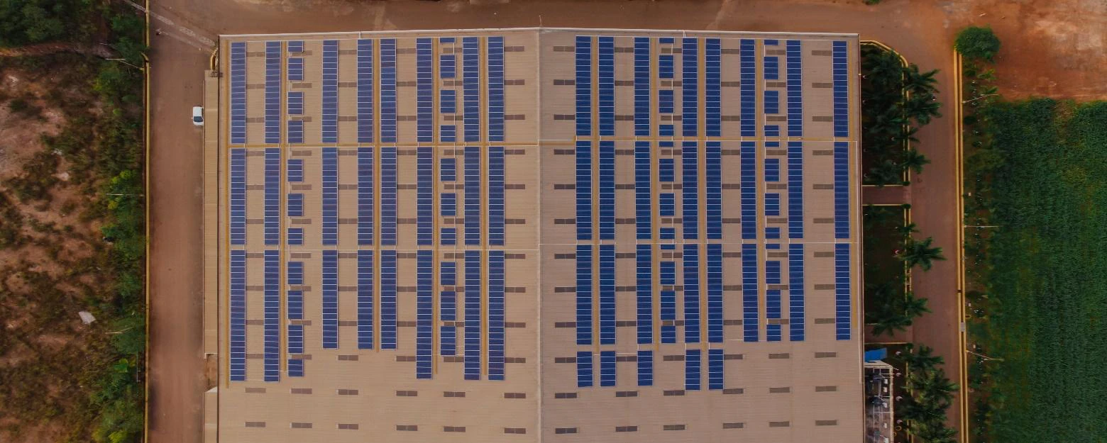 Aerial view of the Microfinish factory with a full rooftop solar array
