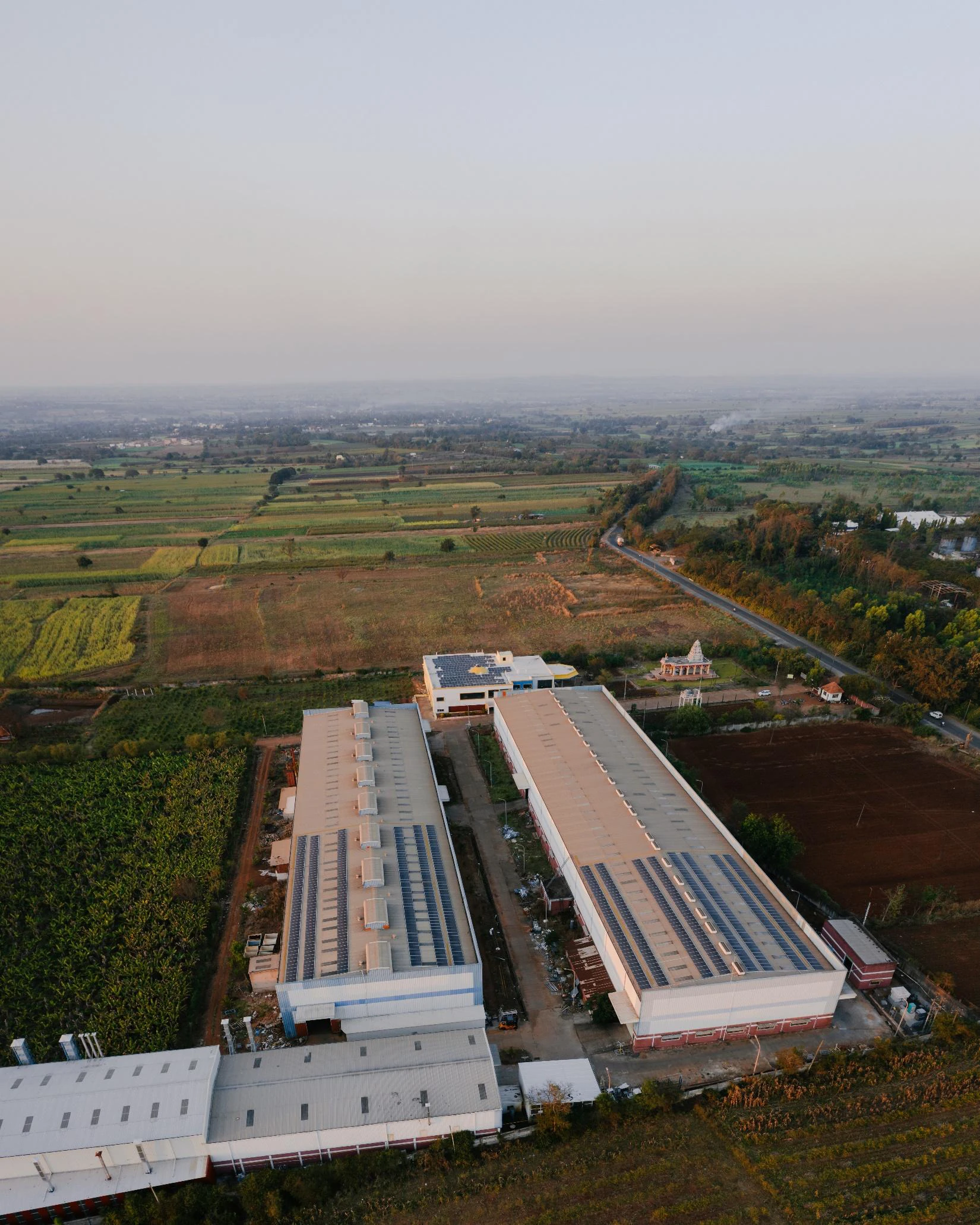 Aerial view of rooftop solar arrays on the MM Industries manufacturing facility