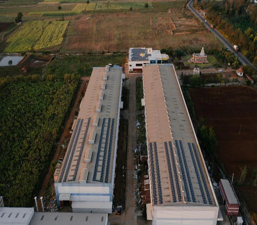 MM Industries building from above with solar panels covering the roof